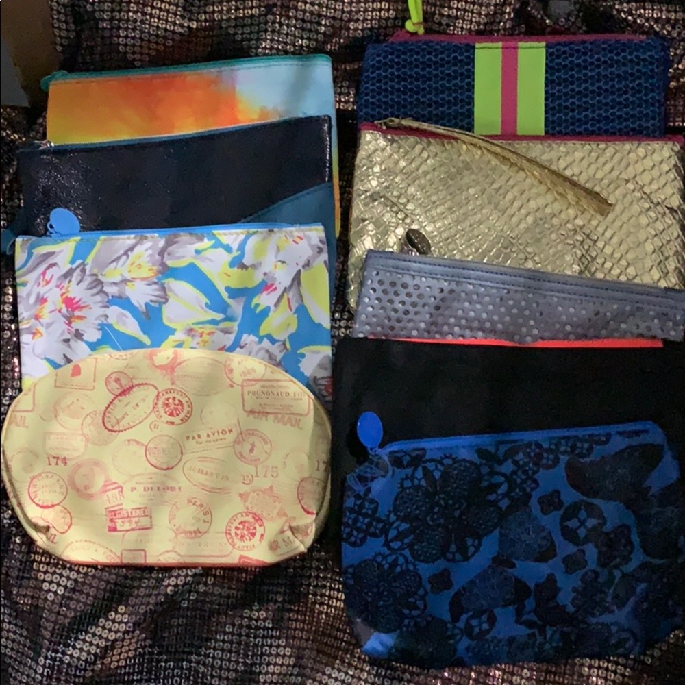 ** buy 1 get 1 free** NWOT 9 Ipsy Bags